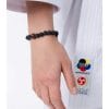 seishin-bracelet-sur-karate-gi-auf-handgelenk